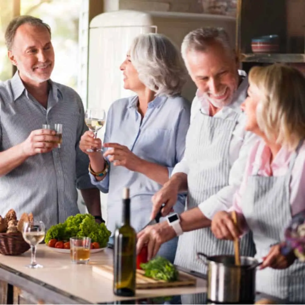 middle aged couple entertaining house guests