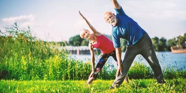 snowbird couple exercising outdoors