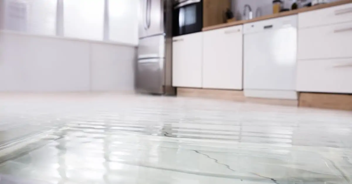 flooded kitchen floor from water leak