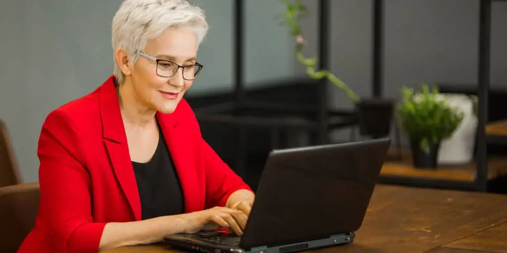 middle aged woman working in an office setting